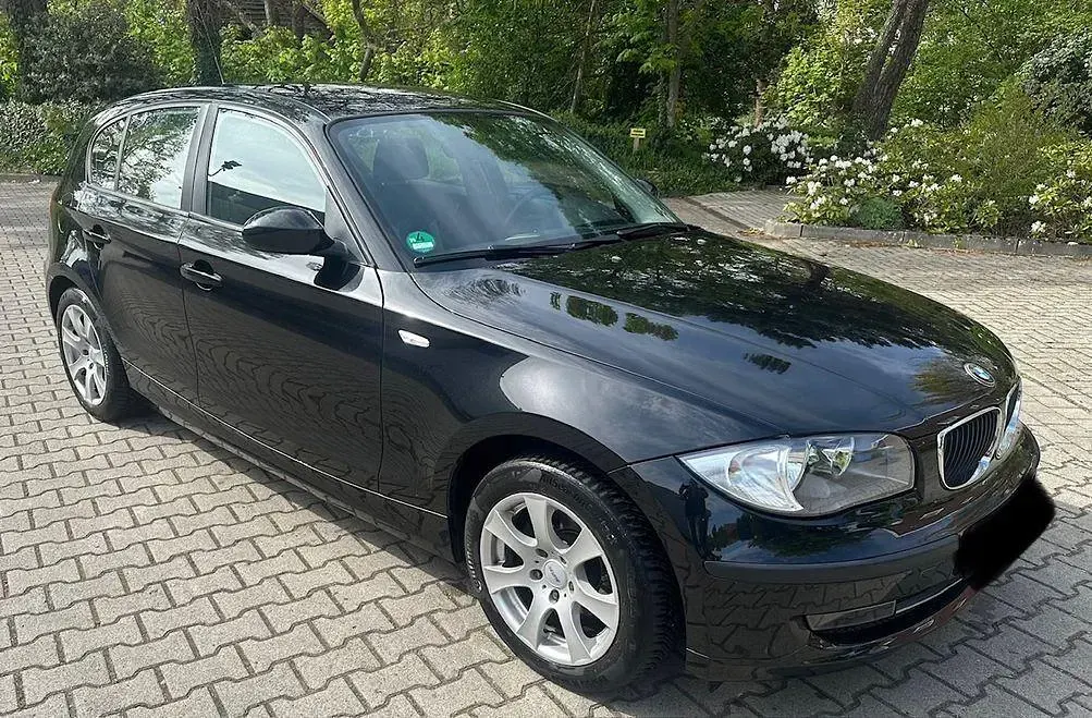 Second-hand BMW 116 122 CP (89 kW) 2009 Negru Hatchback