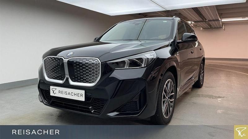 Schwarz Neu 2025 BMW iX1 Performance SUV | 54.990 € (Fairer Preis) - Bild 1/4