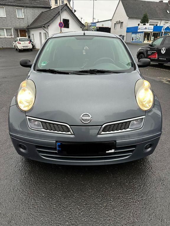 Grau Gebraucht 2009 Nissan Micra Tekna Limousine | 1.899 € (Fairer Preis) - Bild 1/4