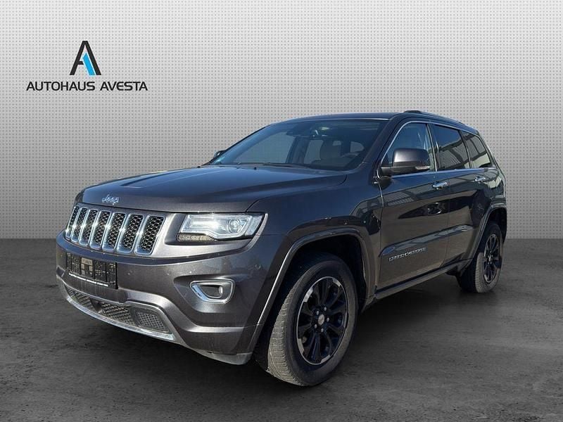 Grau Gebraucht 2013 Jeep Grand Cherokee Overland SUV | 9.990 € - Bild 1/4