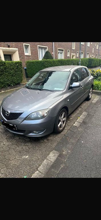 Używany Mazda 3 Active 109 KM (80 kW) 2005 Szary Sedan/Limuzyna