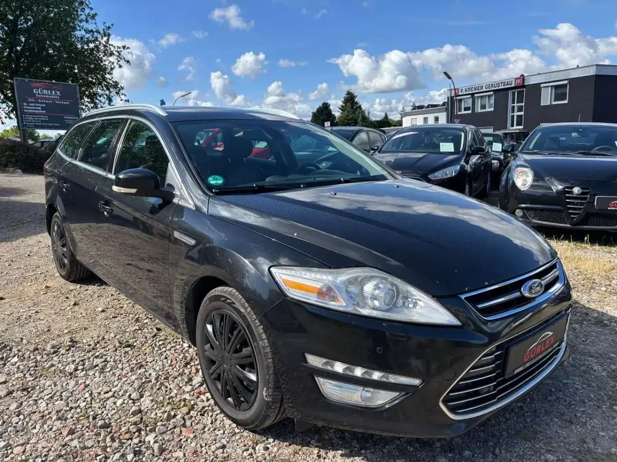 Gebraucht Ford Mondeo Titanium 163 PS (119 kW) 2014 Pantherschwarz metallic Kombi