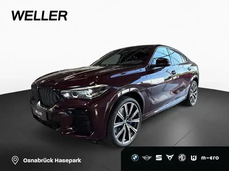 Ametrin (rot) Gebraucht 2022 BMW X6 M M Sport SUV | 74.850 € - Bild 1/4
