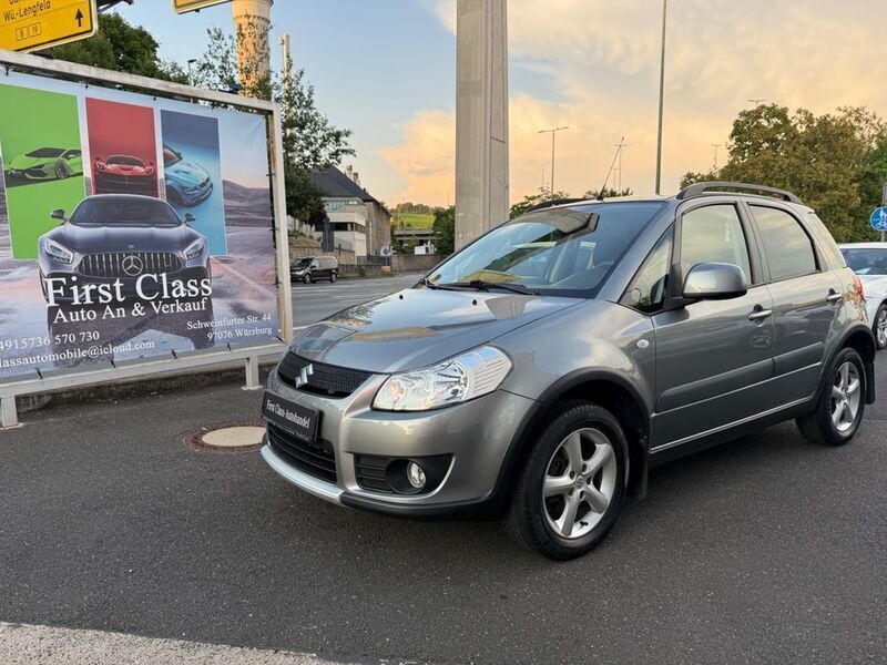 Grau Gebraucht 2007 Suzuki SX4 Club SUV | 4.799 € (Fairer Preis) - Bild 1/4