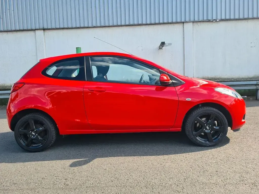 Gebraucht Mazda 2 Inclusive 86 PS (63 kW) 2009 Rot Kleinwagen