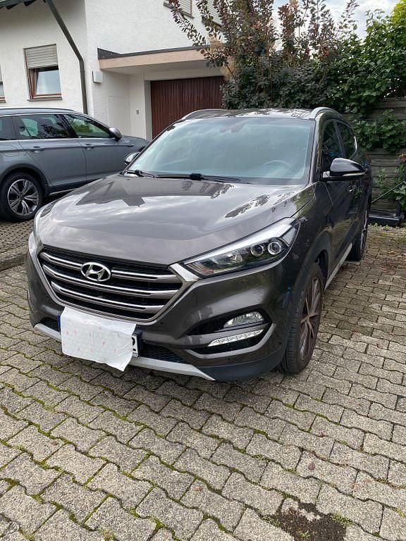 Grau Gebraucht 2018 Hyundai Tucson Style SUV | 17.990 € (Fairer Preis) - Bild 1/4