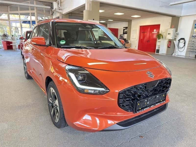 Gebraucht Suzuki Swift Comfort+ 83 PS (61 kW) 2024 Orange Kleinwagen
