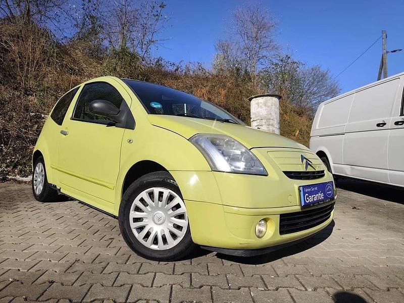Gebraucht Citroën C2 Comfort 60 PS (44 kW) 2006 Lack gelb lackierung Kleinwagen