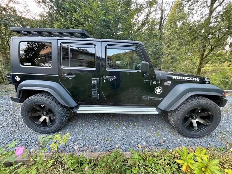 Schwarz Gebraucht 2010 Jeep Wrangler Unlimited SUV | 20.000 € - Bild 1/4