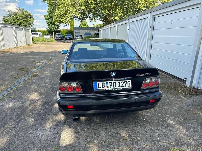 Schwarz Gebraucht 1994 BMW 320 Coupé | 8.000 € - Bild 1/4