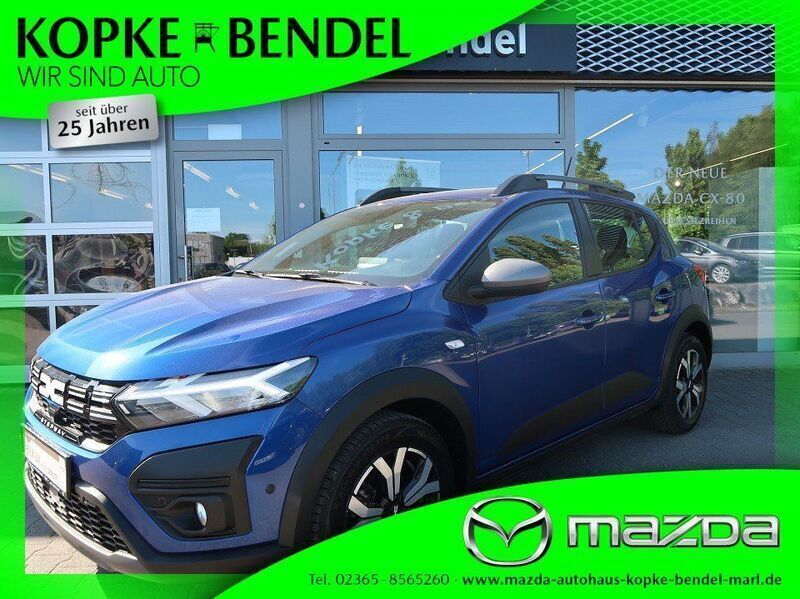 Blau Gebraucht 2023 Dacia Sandero Expression Kleinwagen | 16.320 € (Fairer Preis) - Bild 1/4