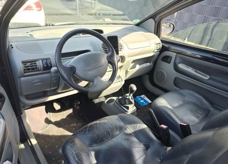 Second-hand Renault Twingo Initiale 75 CP (55 kW) 2003 Albastru Hatchback