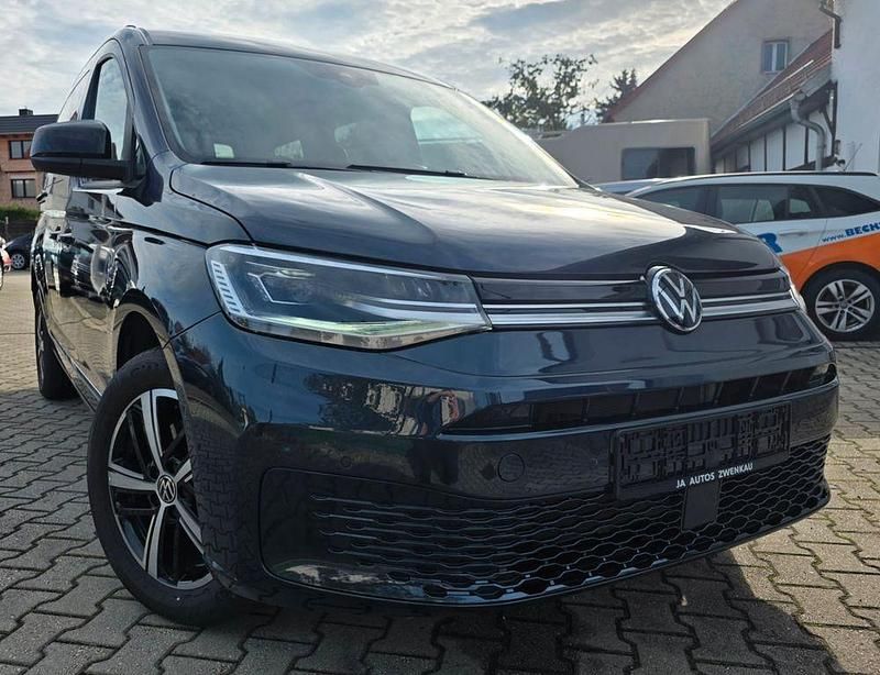 Blau Gebraucht 2024 VW Caddy Maxi Style Van / Kleinbus | 32.999 € (Superpreis) - Bild 1/4