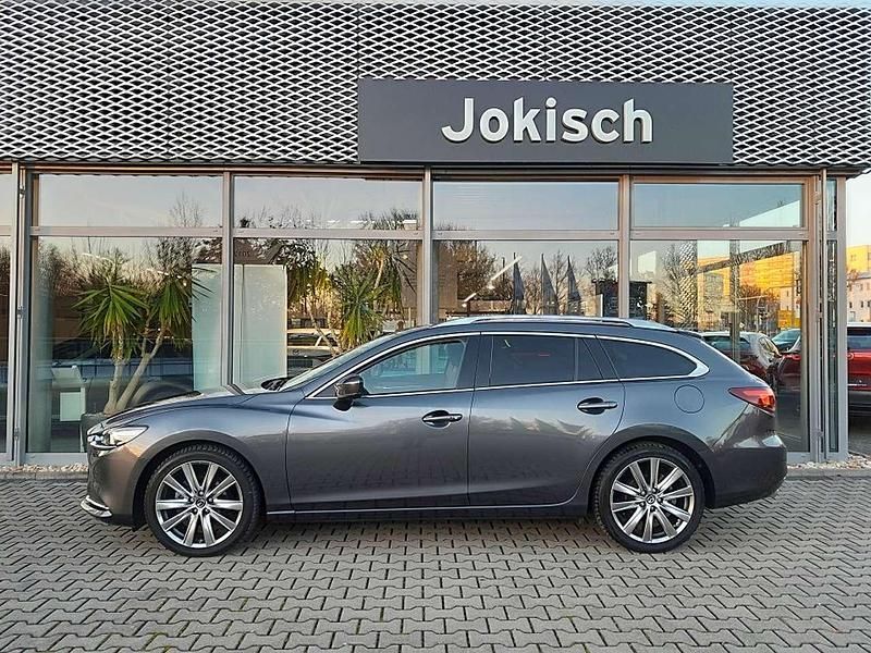 Machine gray Gebraucht 2024 Mazda 6 Takumi-Line Kombi | 31.390 € (Fairer Preis) - Bild 1/4