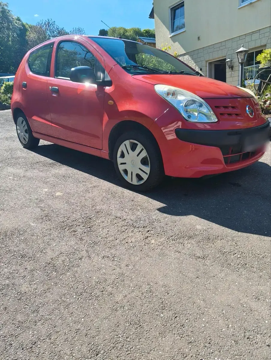 Gebraucht Nissan Pixo 68 PS (50 kW) 2010 Rot Kleinwagen