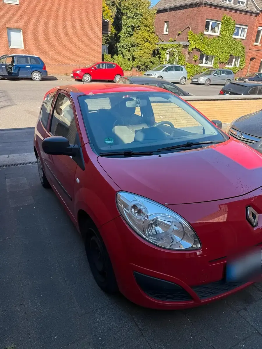 Second-hand Renault Twingo 60 CP (44 kW) 2011 Roșu Hatchback