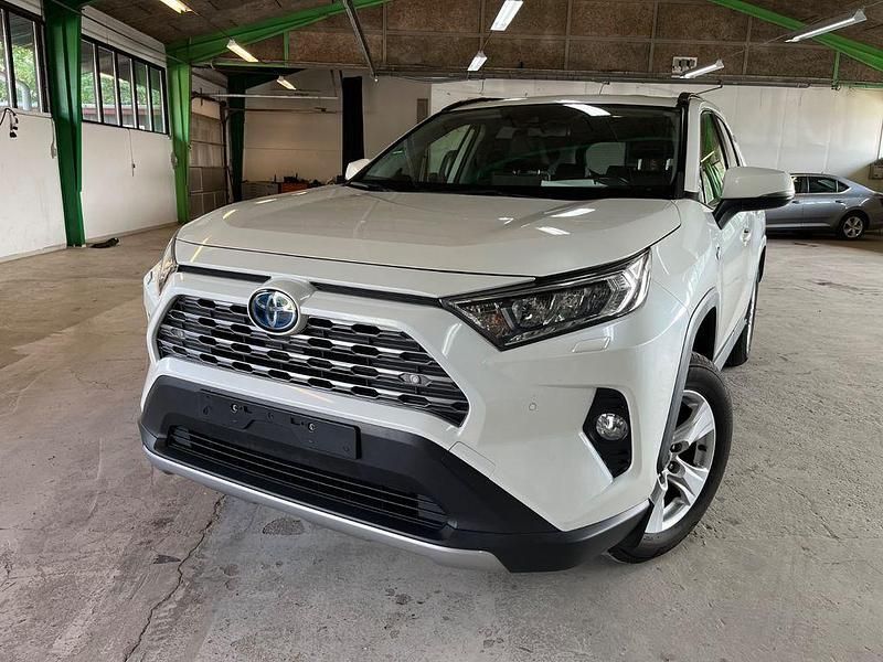 Weiß Gebraucht 2019 Toyota RAV4 Hybrid Lounge SUV | 19.795 € (Guter Preis) - Bild 1/4