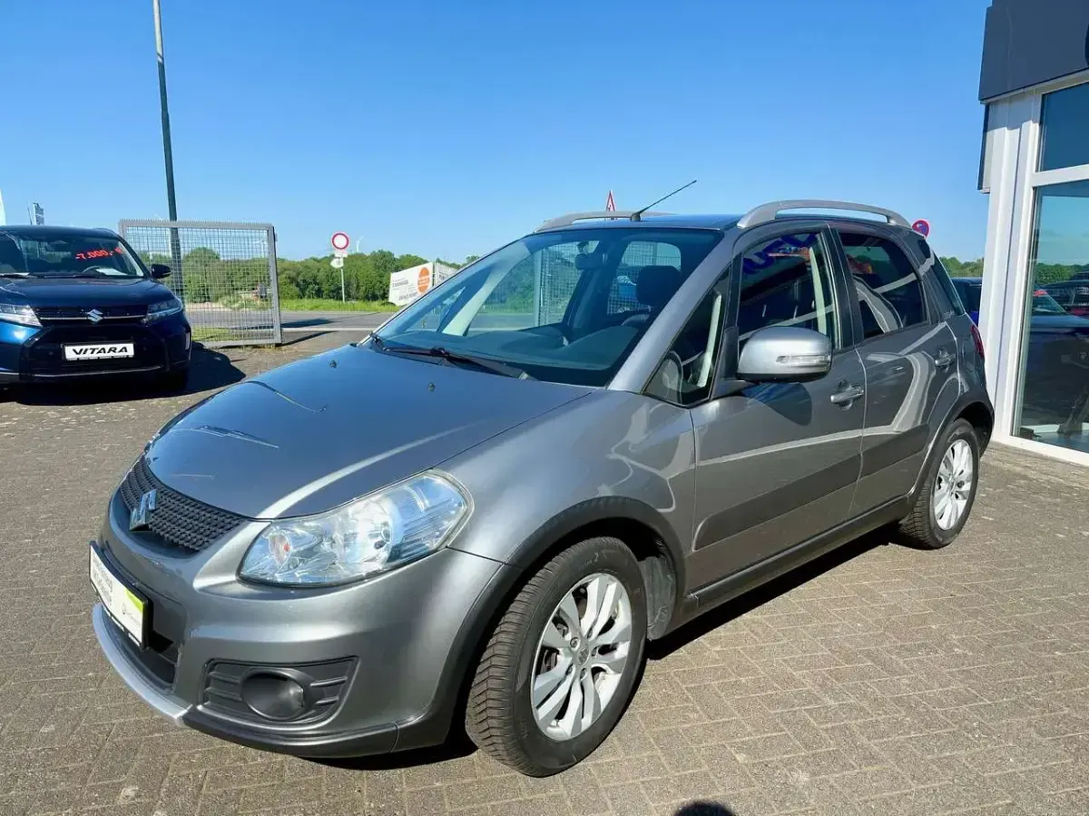 Gebraucht Suzuki SX4 Style 120 PS (88 kW) 2013 Galactic gray metallic Limousine