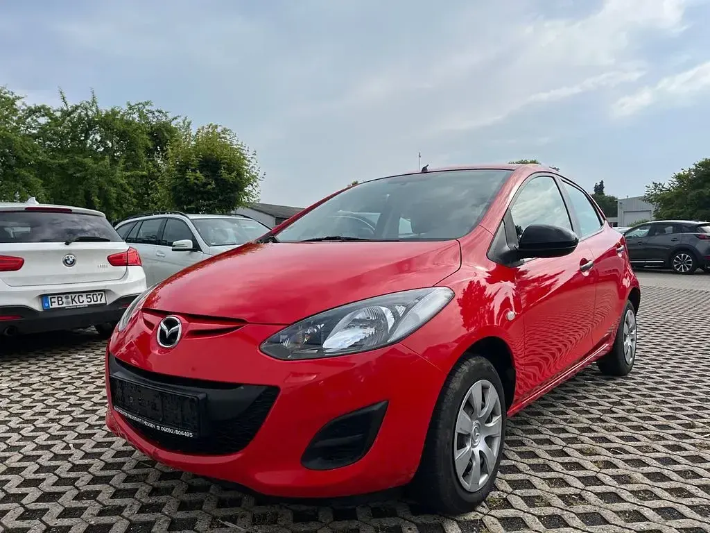 Gebraucht Mazda 2 Prime-Line 75 PS (55 kW) 2012 Rot Kleinwagen