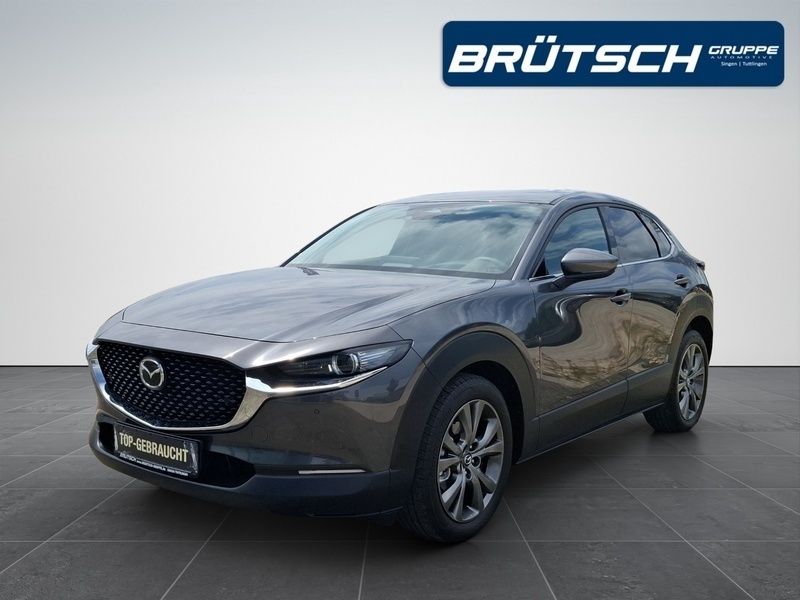 Machine gray metallic Gebraucht 2024 Mazda CX-30 Exclusive-Line SUV | 31.480 € (Etwas zu teuer) - Bild 1/4