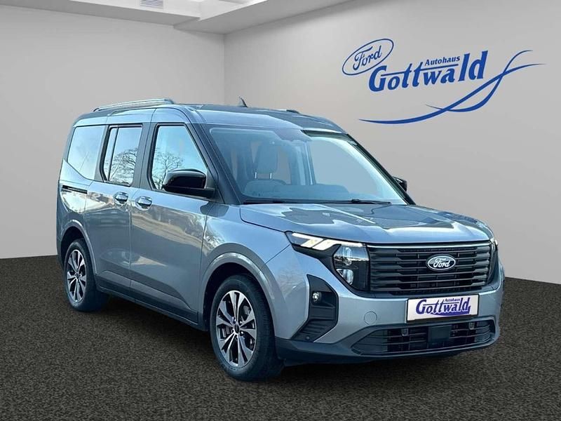 Solarsilber Gebraucht 2024 Ford Tourneo Courier Titanium Van / Kleinbus | 24.990 € (Fairer Preis) - Bild 1/4