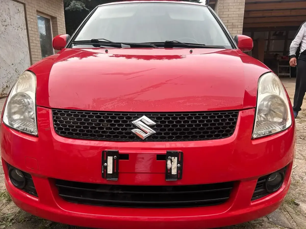 Gebraucht Suzuki Swift 75 PS (55 kW) 2009 Rot Kleinwagen