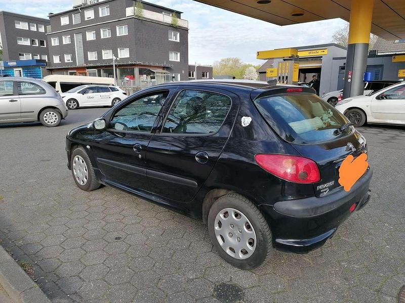 Gebraucht Peugeot 206 75 PS (55 kW) 2009 Schwarz Limousine