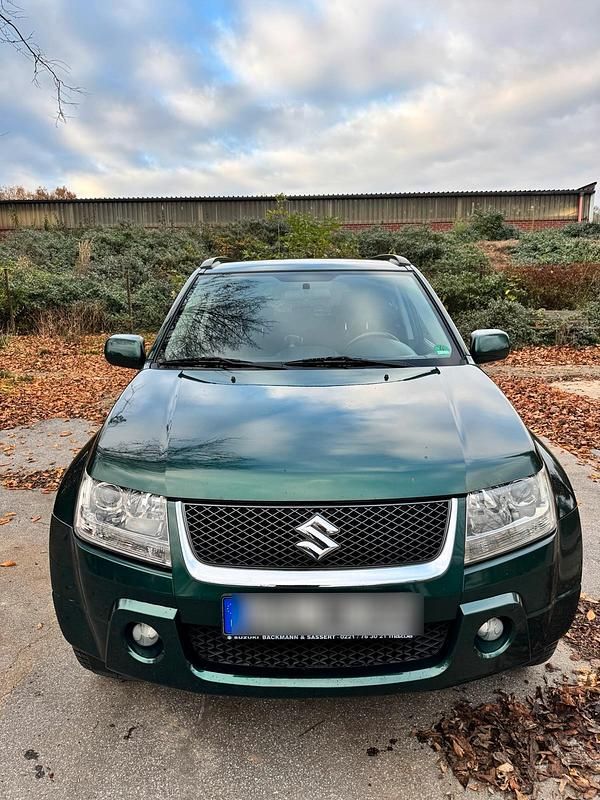 Grün Gebraucht 2006 Suzuki Grand Vitara SUV | 4.390 € (Fairer Preis) - Bild 1/4