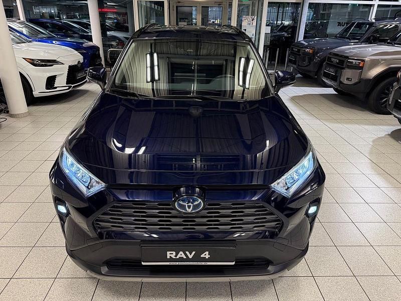 Blau Gebraucht 2023 Toyota RAV4 Hybrid SUV | 35.895 € (Fairer Preis) - Bild 1/4