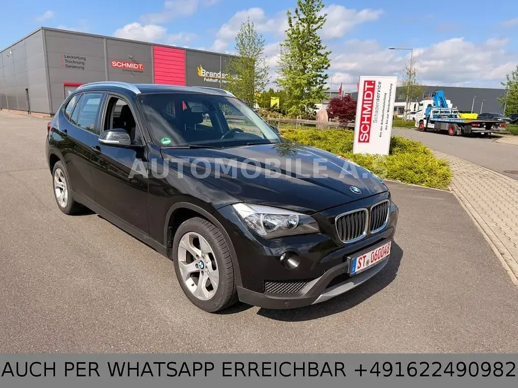 Second-hand BMW X1 116 CP (85 kW) 2013 Negru SUV