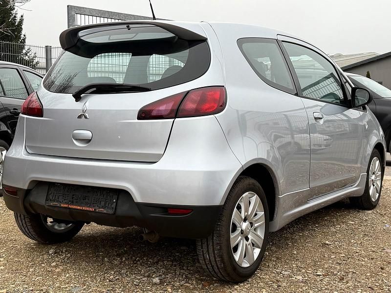 Second-hand Mitsubishi Colt 75 CP (55 kW) 2012 Argintiu Hatchback