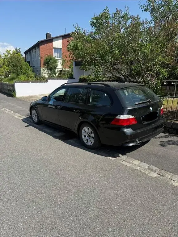 Second-hand BMW 520 177 CP (130 kW) 2008 Negru Break