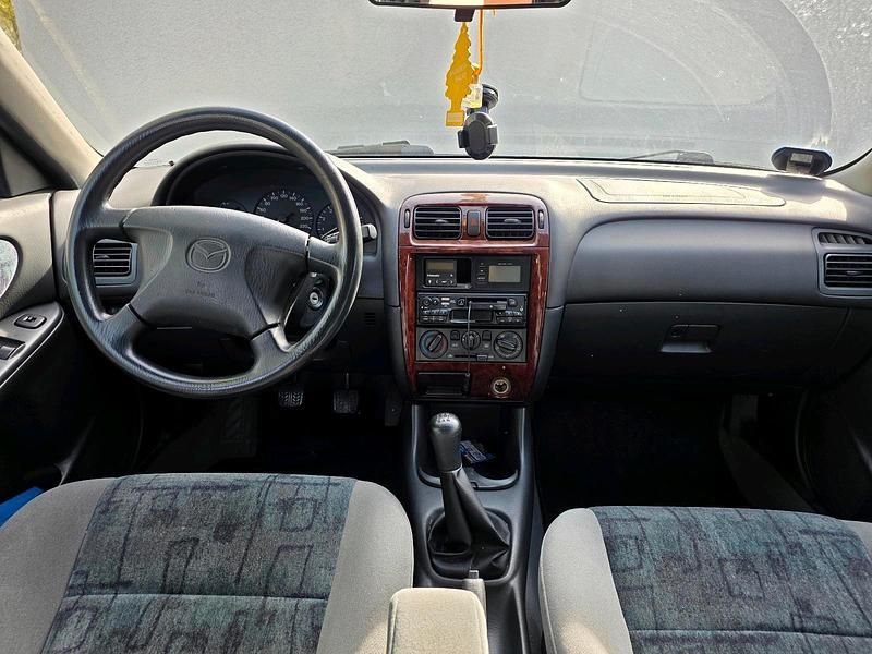 Second-hand Mazda 626 90 CP (66 kW) 1999 Andere farben Berlinǎ