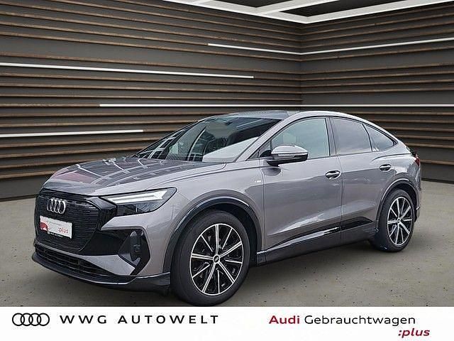 Taifungrau metallic Gebraucht 2022 Audi Q4 Sportback e-tron Ambiente SUV | 31.980 € (Teuer) - Bild 1/4