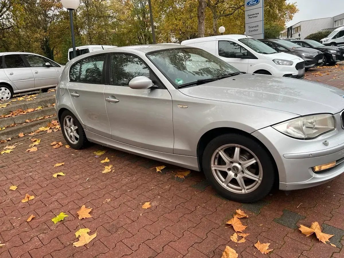 Second-hand BMW 116 122 CP (89 kW) 2009 Gri Hatchback