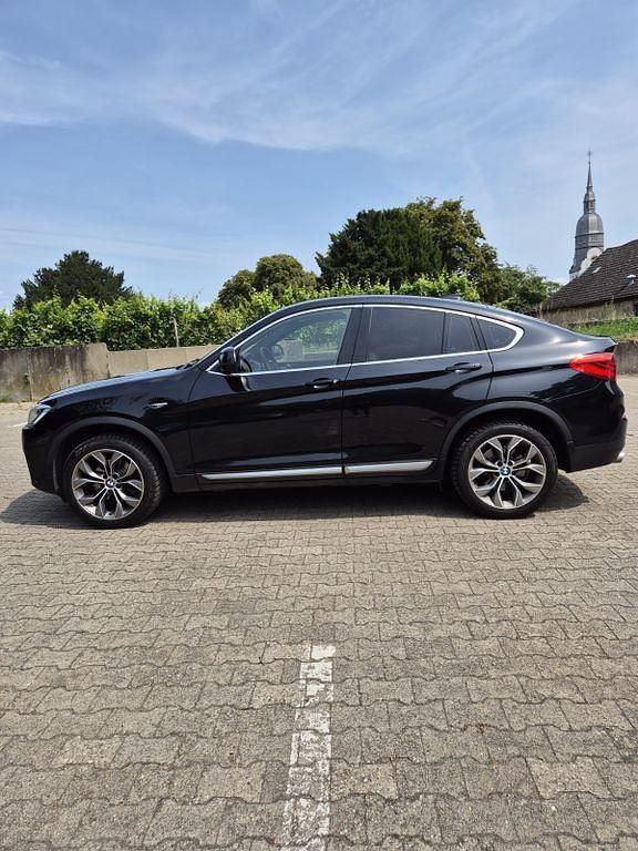 Second-hand BMW X4 258 CP (189 kW) 2015 Negru SUV