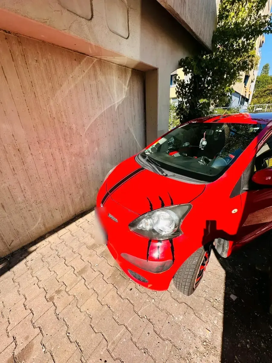 Gebraucht Toyota Aygo 68 PS (50 kW) 2009 Rot Kleinwagen