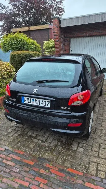Gebraucht Peugeot 206 Urban Move 73 PS (53 kW) 2011 Schwarz Limousine