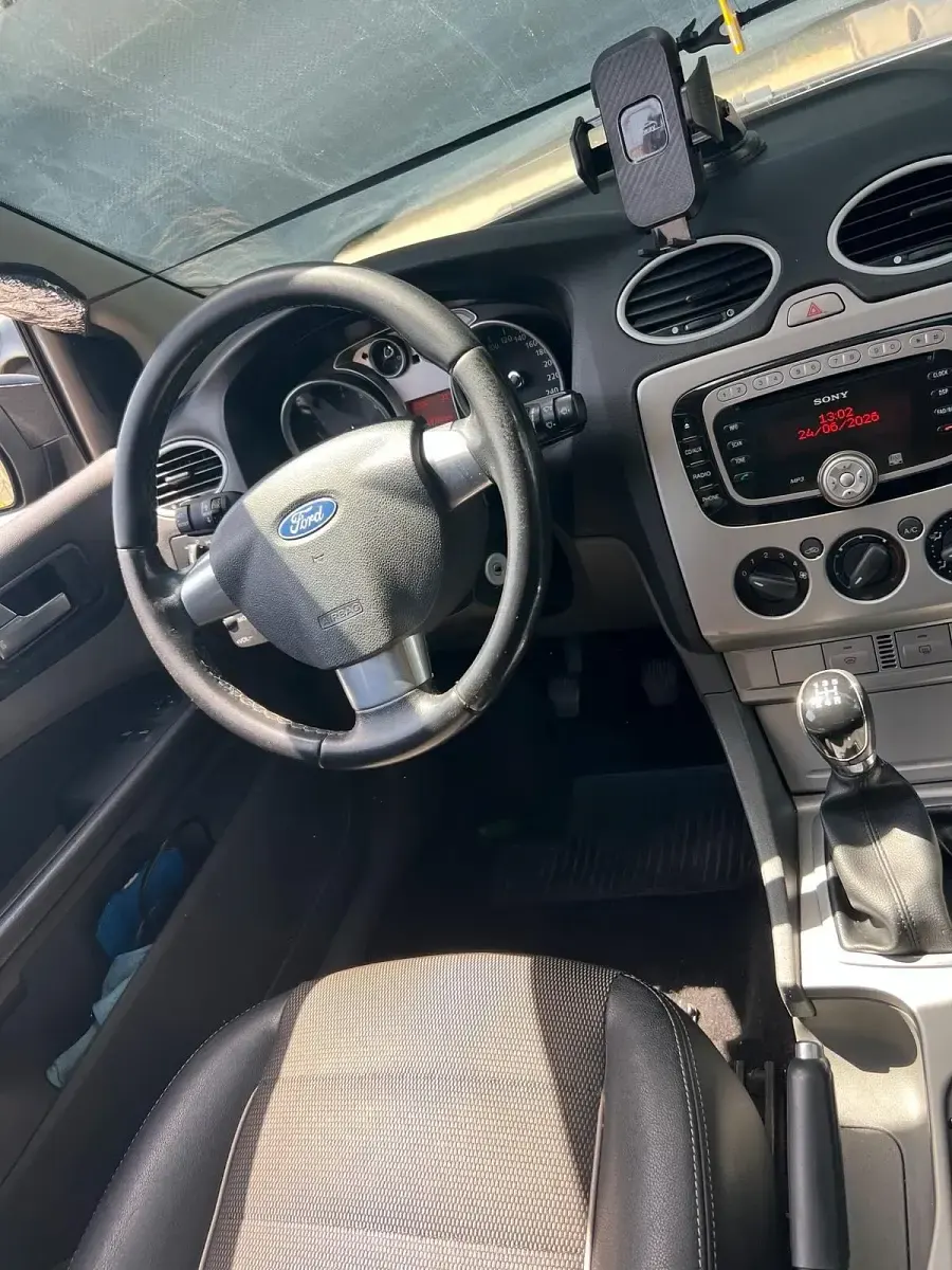 Gebraucht Ford Focus 125 PS (91 kW) 2010 Schwarz Kombi