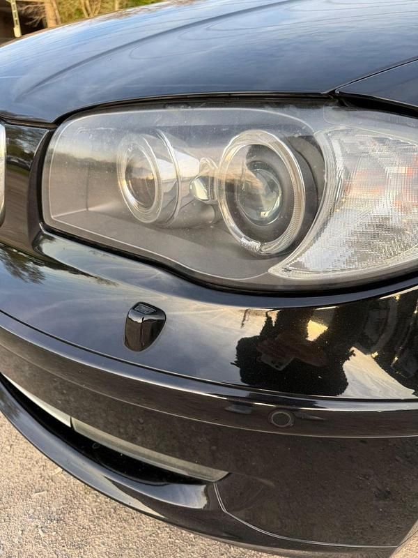 Używany BMW 116 122 KM (89 kW) 2011 Czarny Hatchback