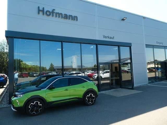 Grün Gebraucht 2021 Opel Mokka-e SUV | 16.950 € (Etwas zu teuer) - Bild 1/4