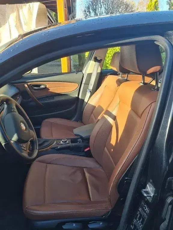 Second-hand BMW 120 177 CP (130 kW) 2010 Negru Hatchback