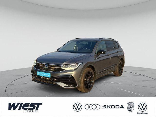 Platinum grey metallic Gebraucht 2025 VW Tiguan Allspace R-line SUV | 50.880 € (Teuer) - Bild 1/4