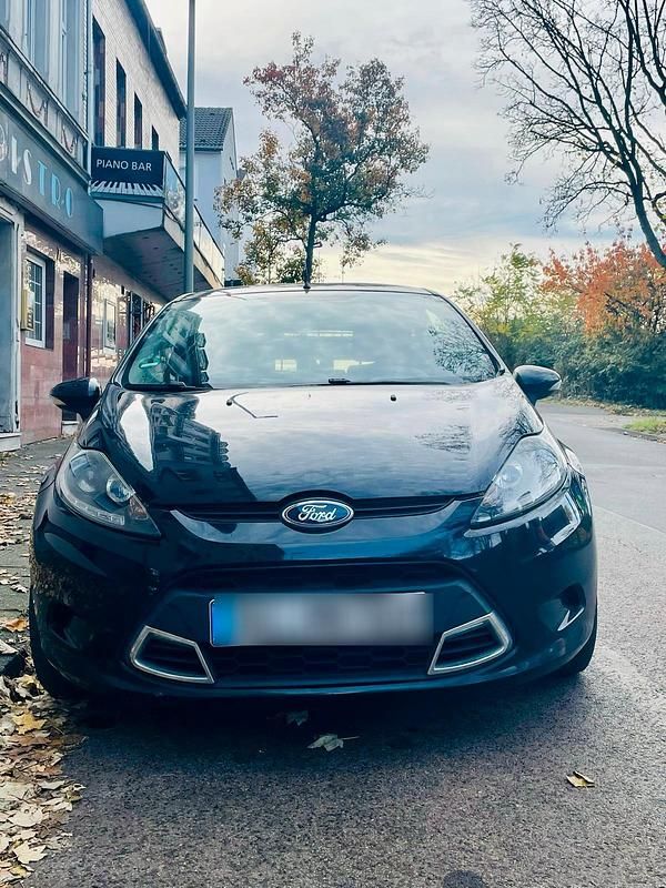 Schwarz Gebraucht 2009 Ford Fiesta Coupé | 1.999 € - Bild 1/4