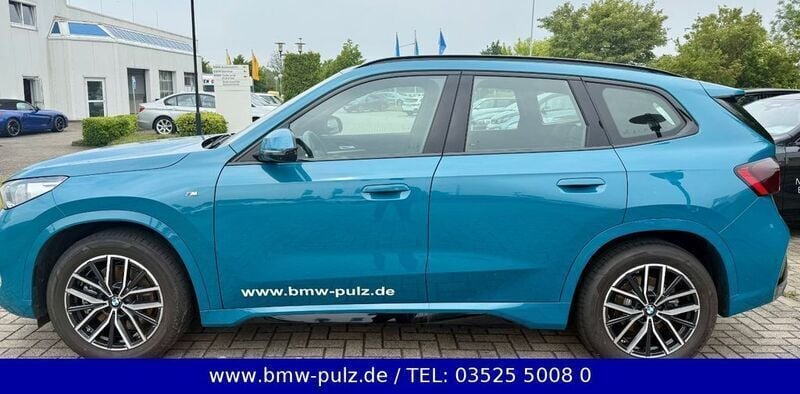 Bmw individual blue bay lagoon Gebraucht 2024 BMW X1 M Sport SUV | 62.640 € - Bild 1/4