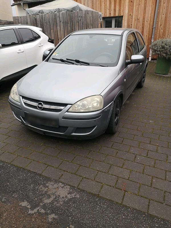 Grau Gebraucht 2004 Opel Corsa Kleinwagen | 750 € - Bild 1/4