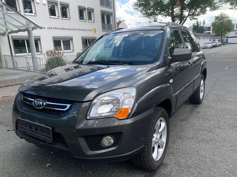 Grau Gebraucht 2010 Kia Sportage SUV | 4.999 € (Fairer Preis) - Bild 1/4