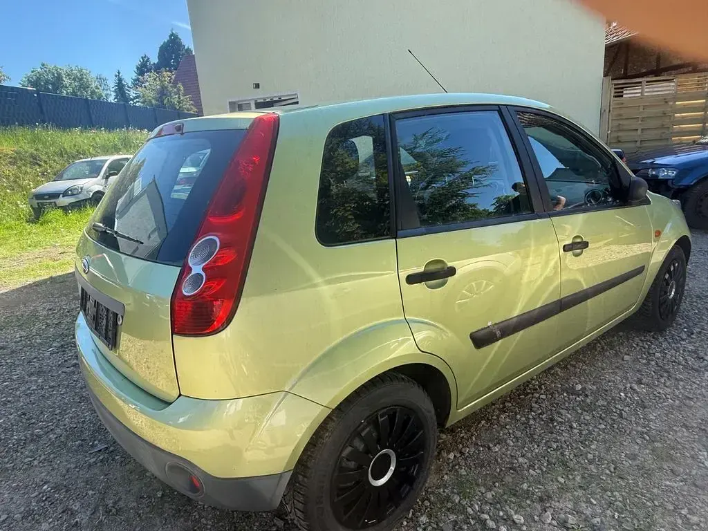 Gebraucht Ford Fiesta Ambiente 60 PS (44 kW) 2006 Gelb Kleinwagen