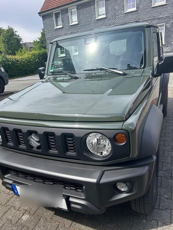 Grün Gebraucht 2022 Suzuki Jimny SUV | 24.500 € (Superpreis) - Bild 1/4