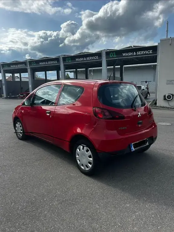 Gebraucht Mitsubishi Colt 75 PS (55 kW) 2009 Rot Kleinwagen
